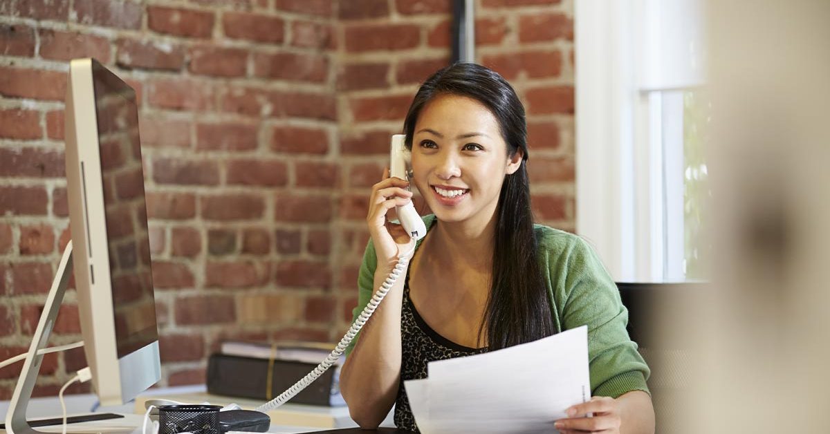 female entrepreneur on a work call at home